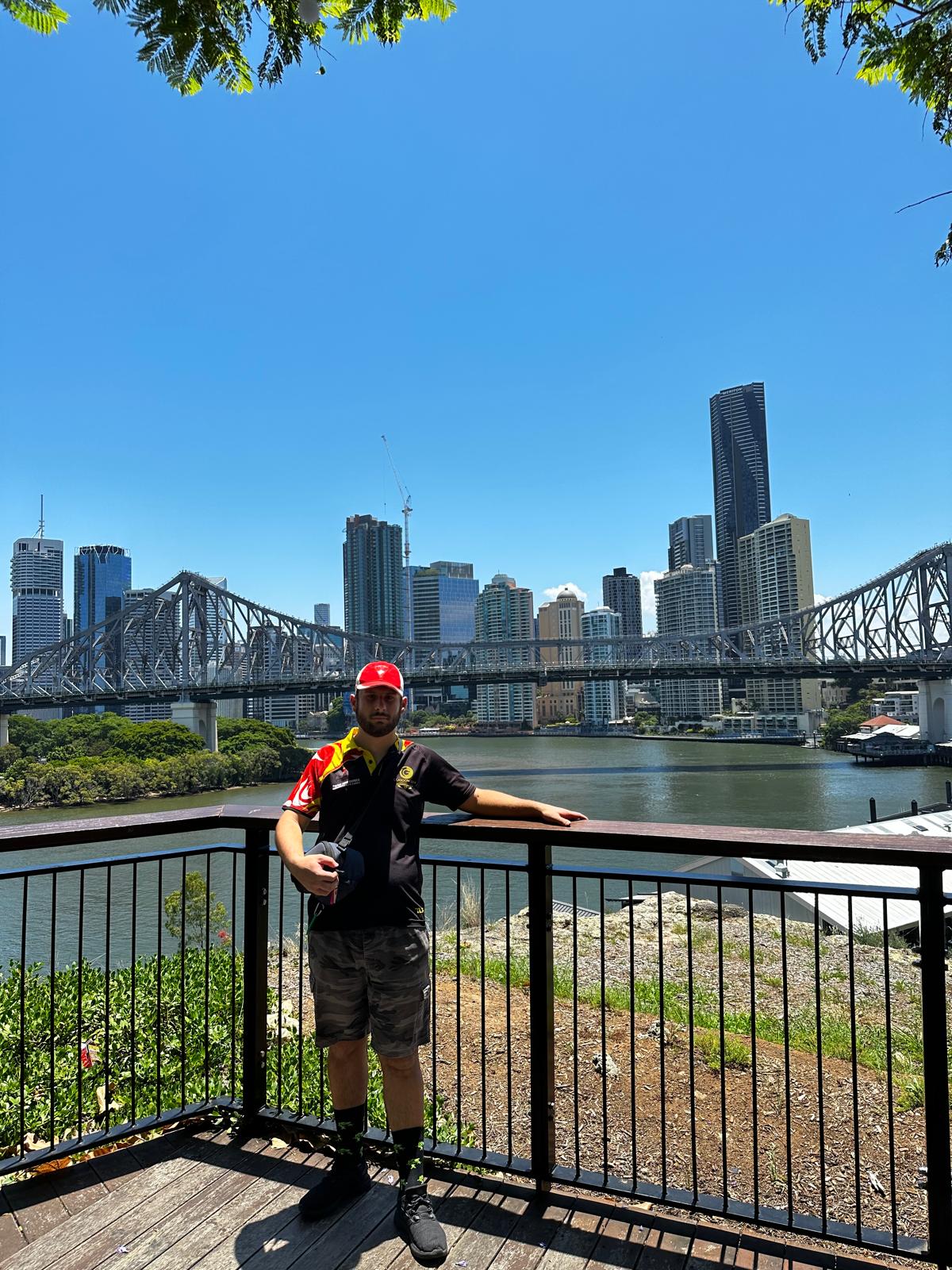 Participant in front of the Brisbane Story Bridge and city skyline